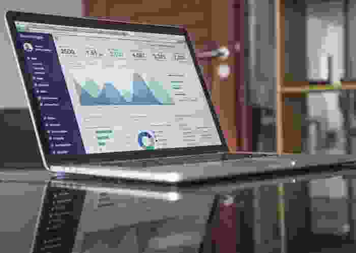 Marketing analytics graphs and KPI monitoring on screen